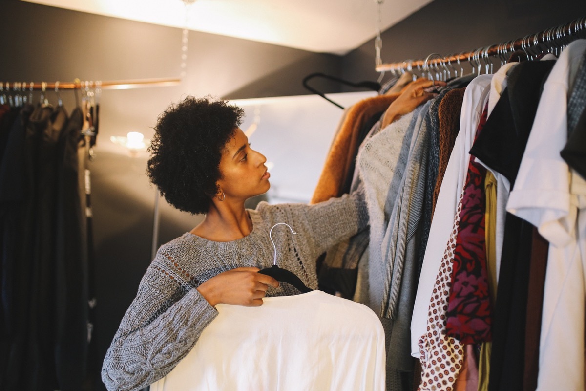 woman organizing closet