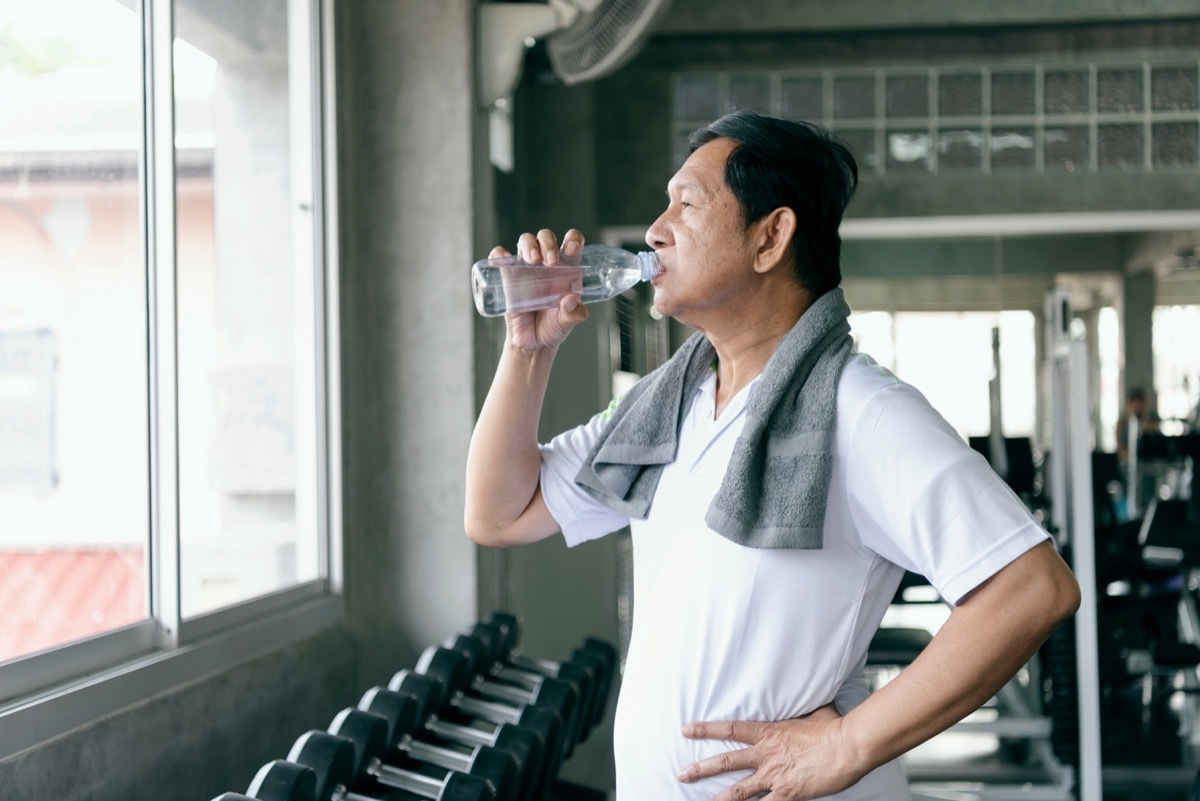 old man drinking water after exercising, healthier man