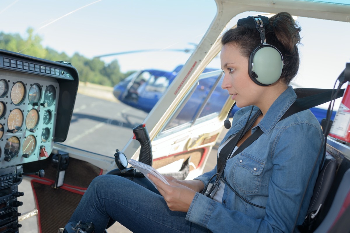 female pilot studying