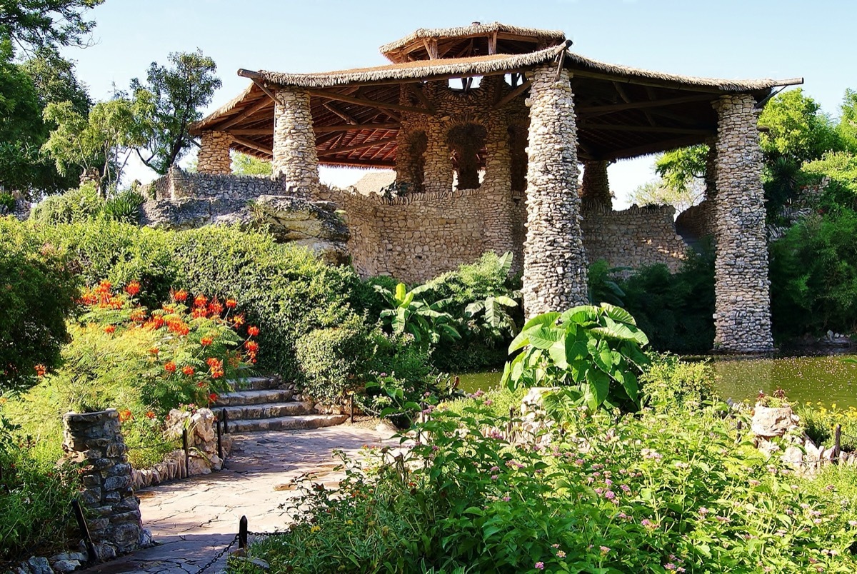 stone building on a pond in the tea garden in san antonio