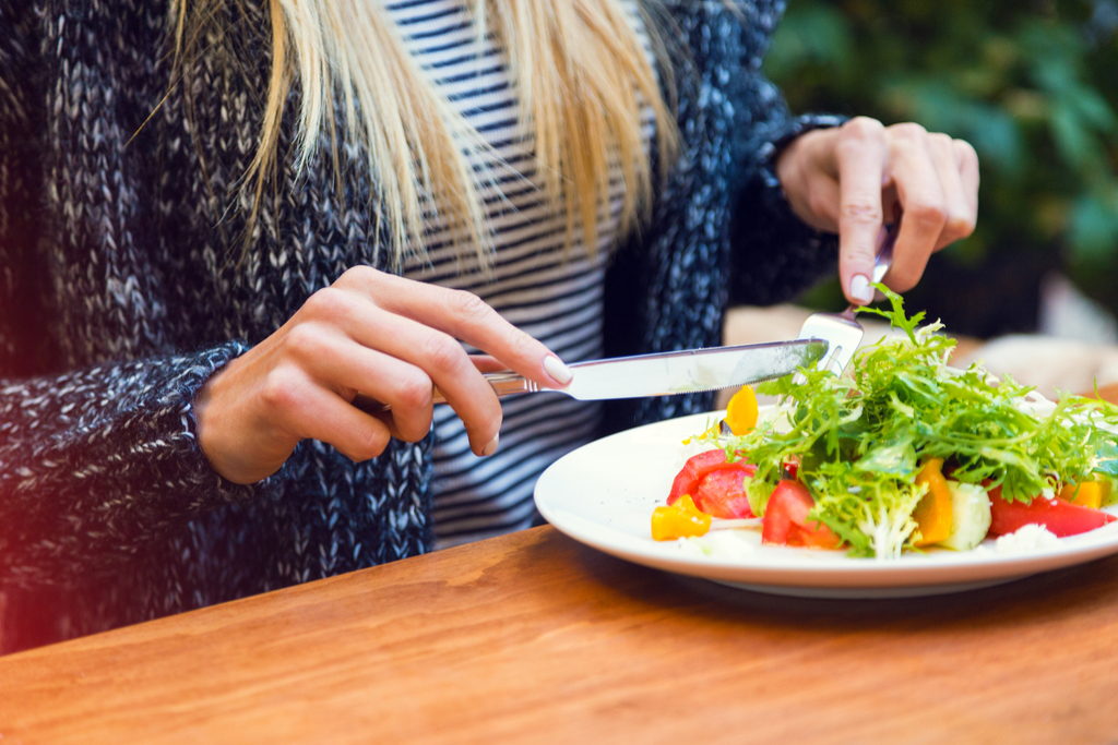 Woman Eating Salad