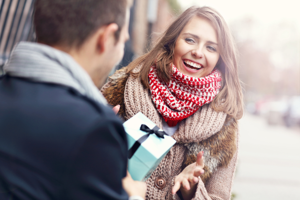 Man Giving Woman Gift Romance