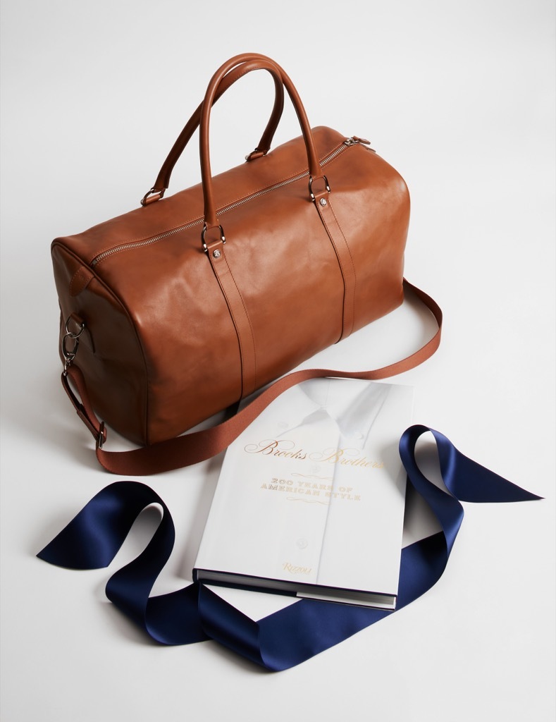 brooks brothers cognac leather duffel bag and 200 anniversary rizzoli book