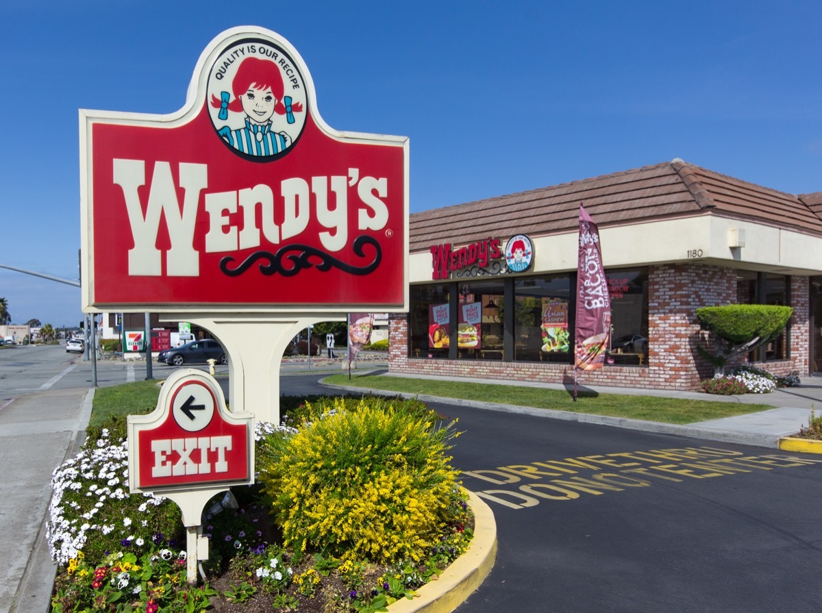 the exterior and sign of a Wendy's restaurant in Seaside, California