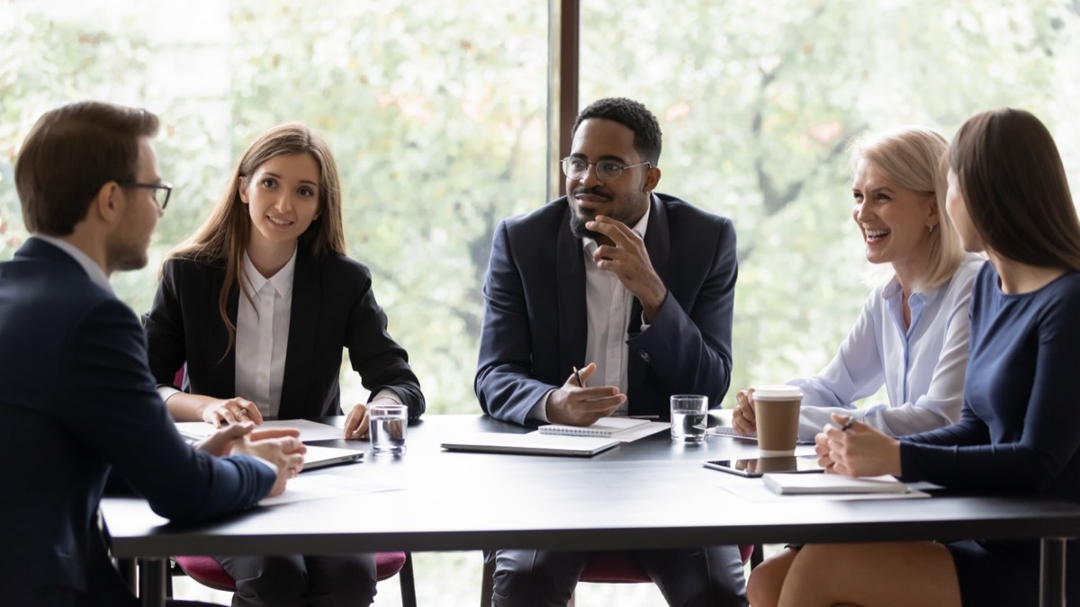 Co-workers Listening to Each Other