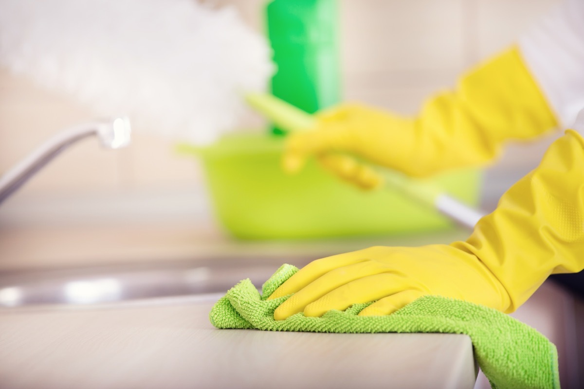 wiping kitchen counter