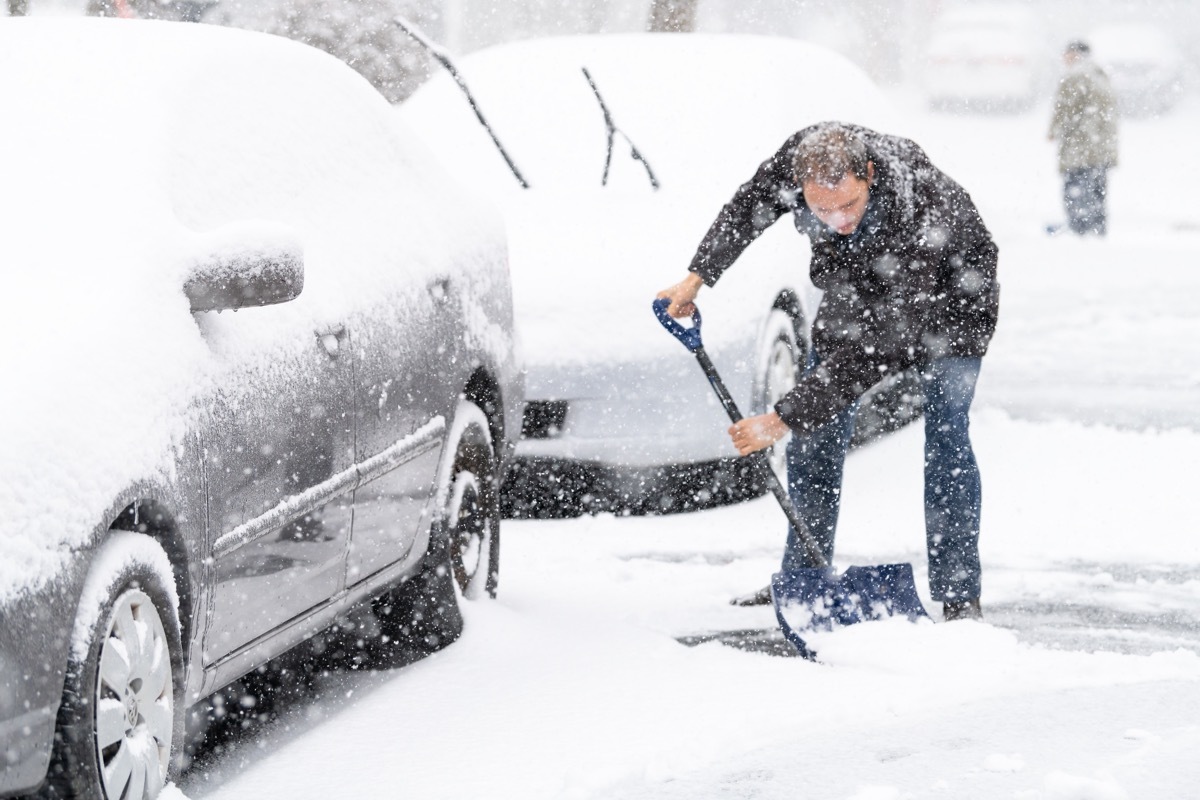 man shoveling snow