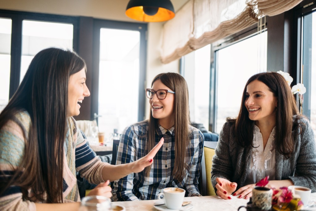 three girlfriends talking