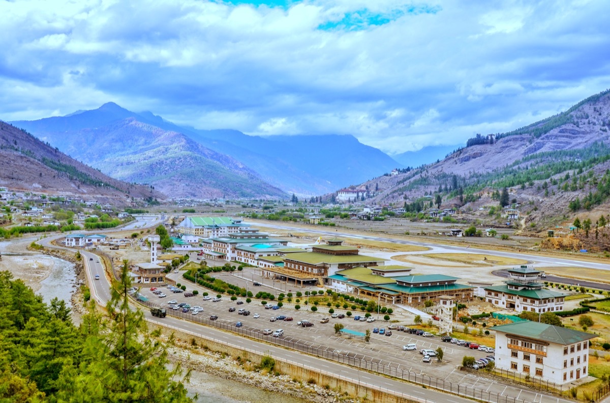 paro airport in between the himalayan mountains