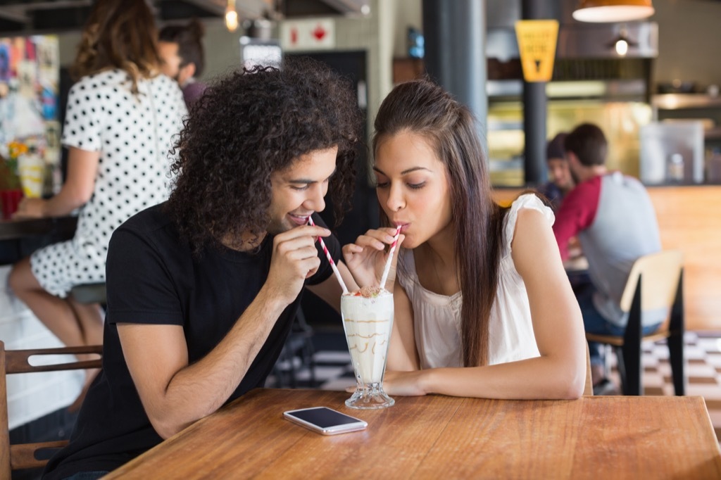 couple drinking milkshakes