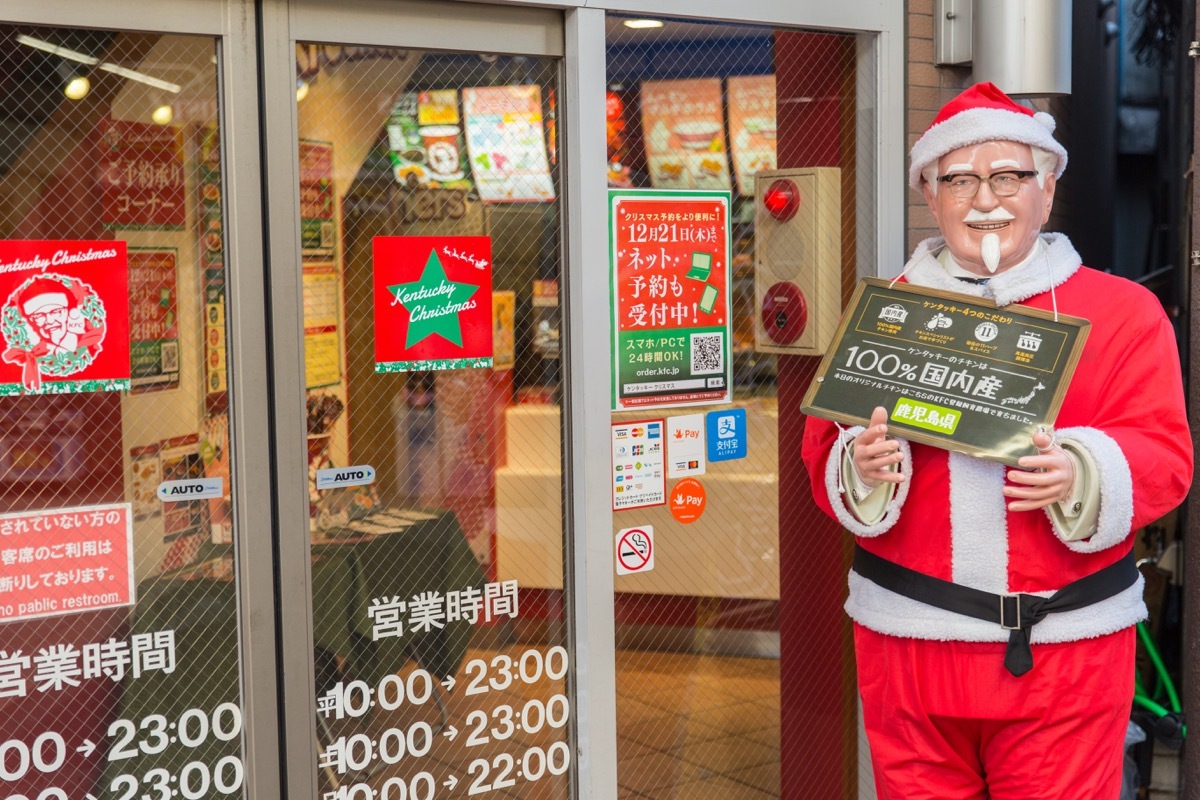 santa in front of kfc in japan