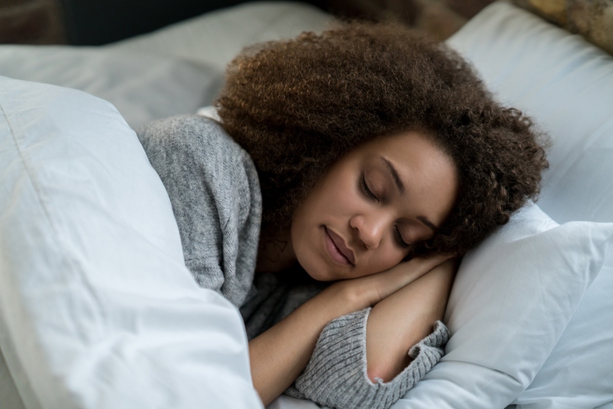 Woman sleeping in bed