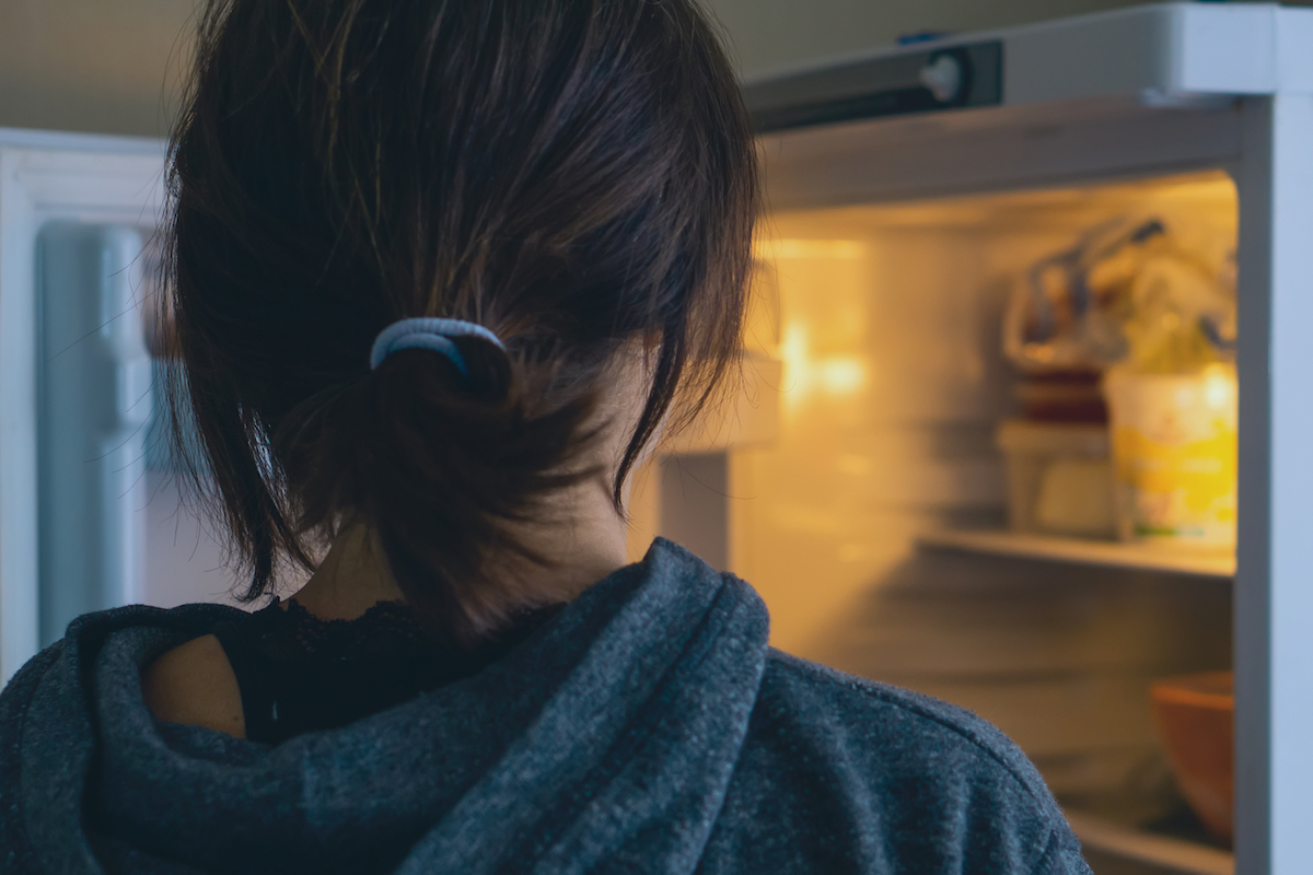 woman-looking-in-fridge