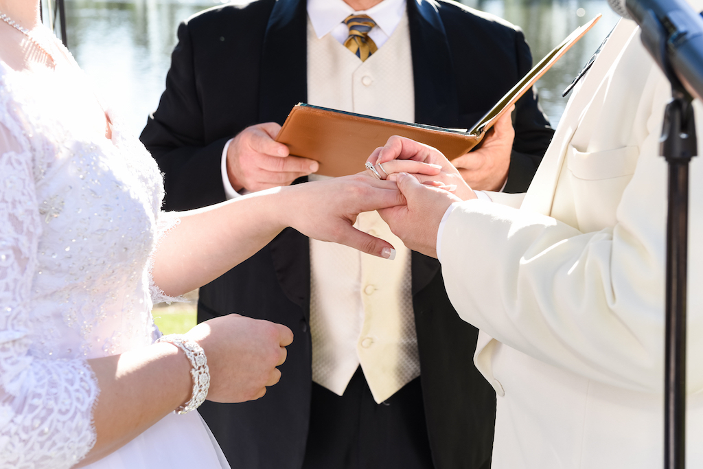 exchanging rings at a wedding ceremony