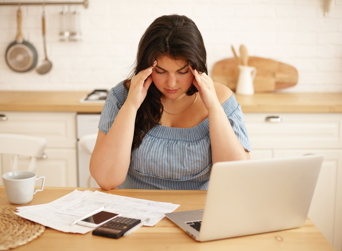 overweight woman stressed with work