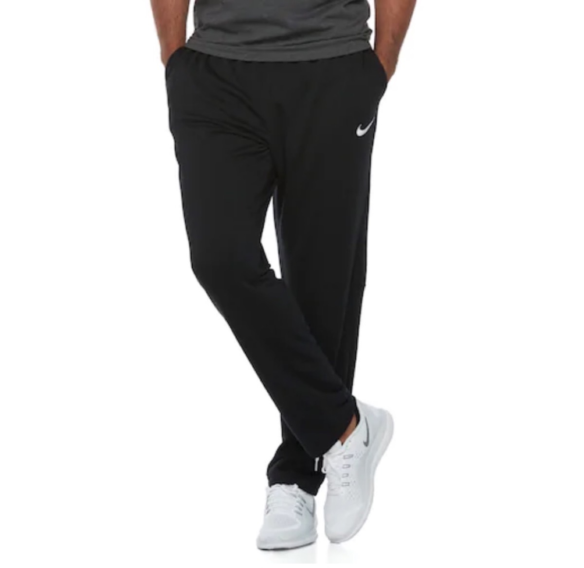 man wearing black fleece pants and gray t-shirt