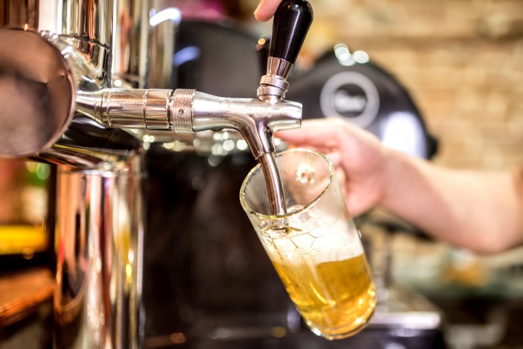 Pouring beer from tap college professor secrets