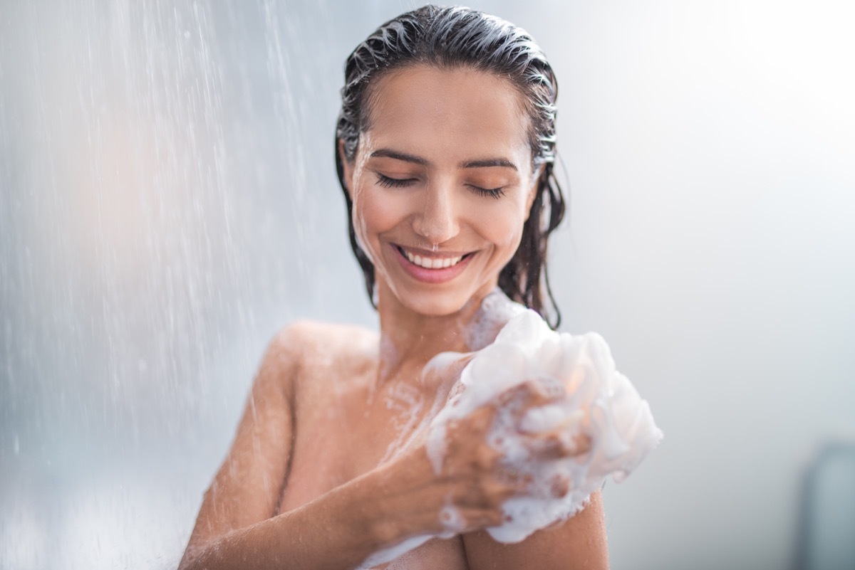 young woman showering