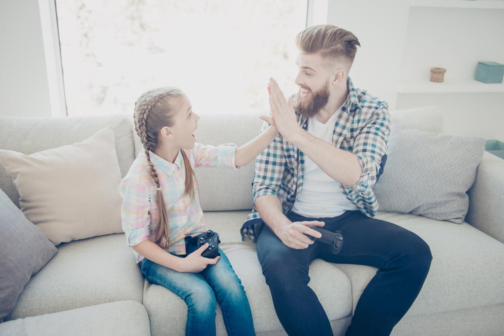 Dad Giving Daughter High Five