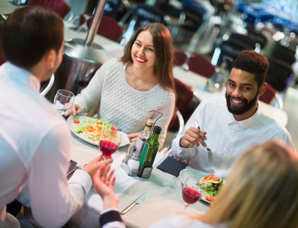 double date couples eating at a restaurant, open marriage