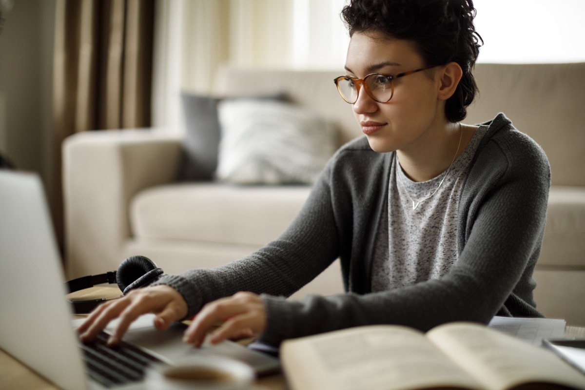 Young woman working at home