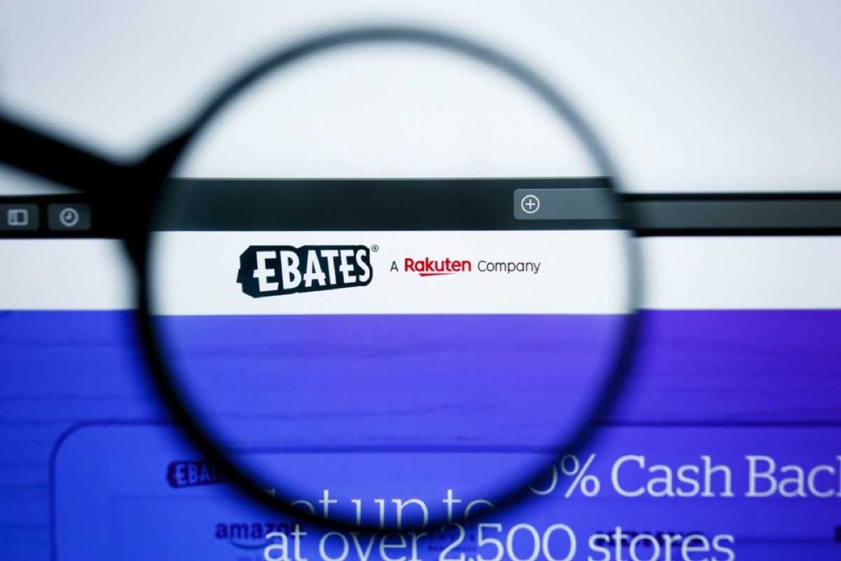 ebates extension on computer screen with magnify glass over the logo 