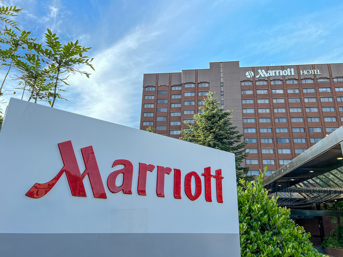 A Marriott sign in front of a Marriott hotel