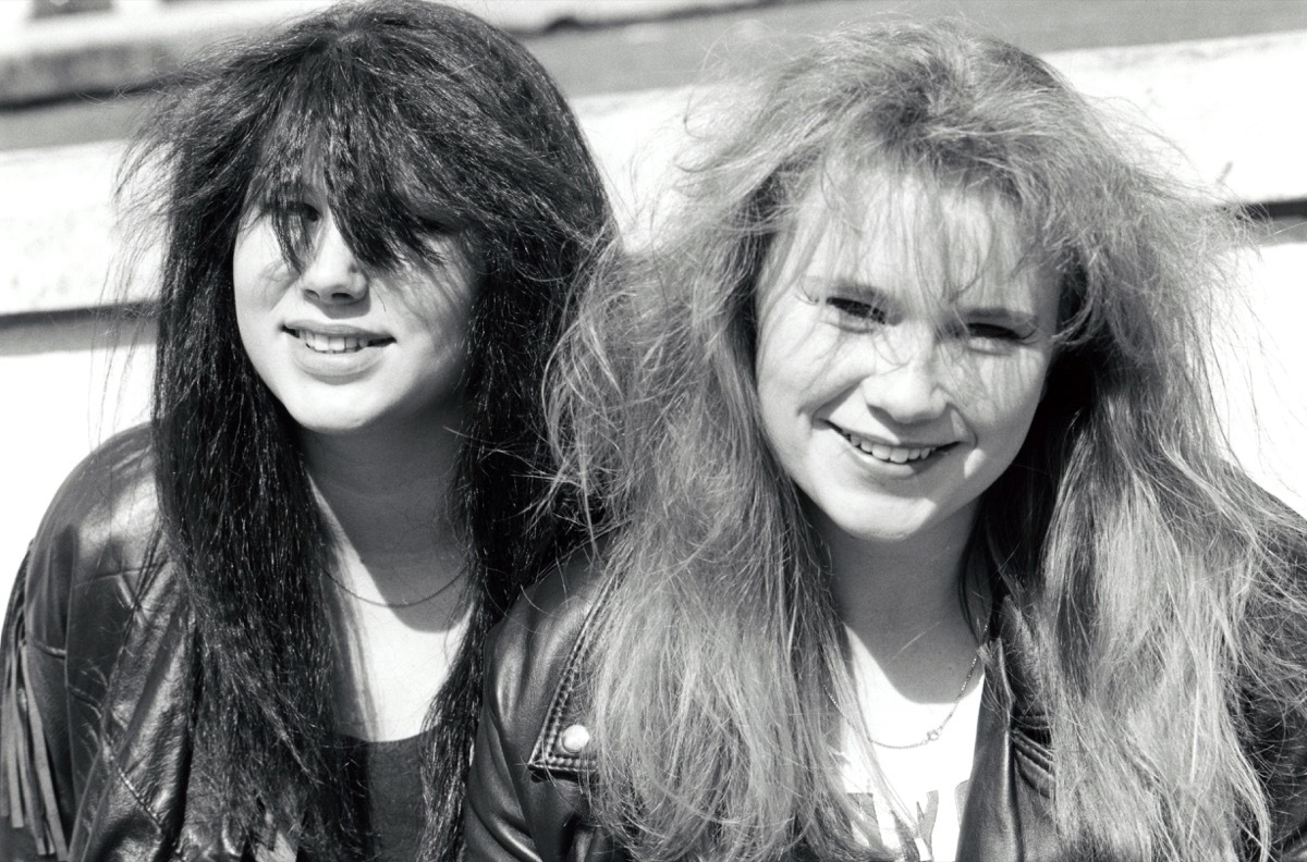 Teenage girls with big hair in 1980s