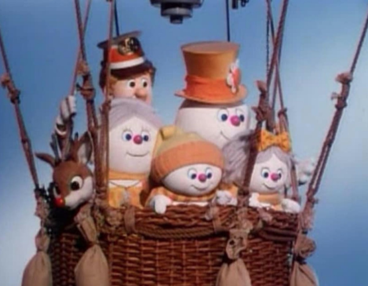 snowmen in hot air balloon basket