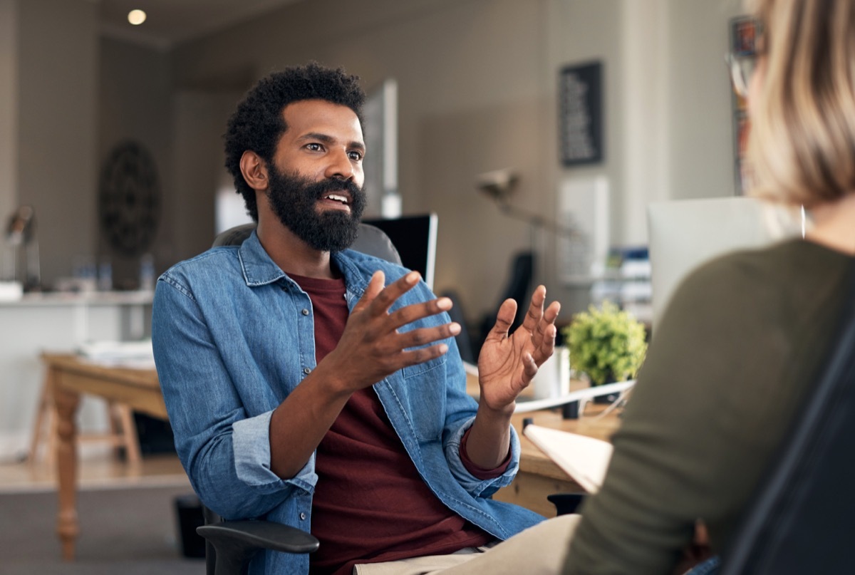 shot of a woman and man having a serious conversation