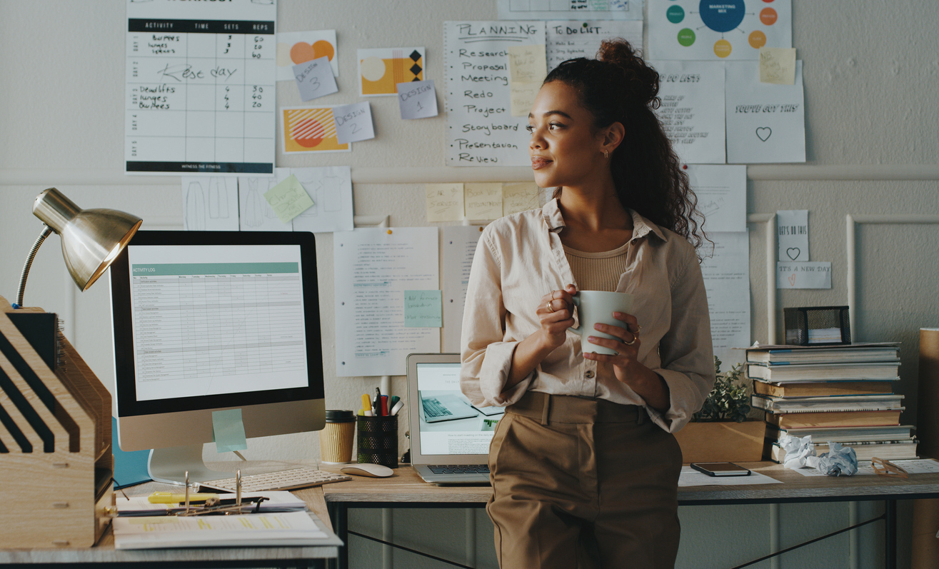 shot of young black woman at work