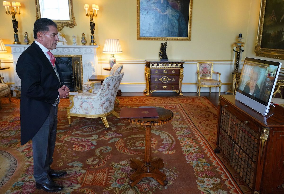 Queen Elizabeth appearing on a computer screen during a virtual appointment with Colombia's ambassador to the U.K. Alvaro Gomez Jaramillo in April 2022