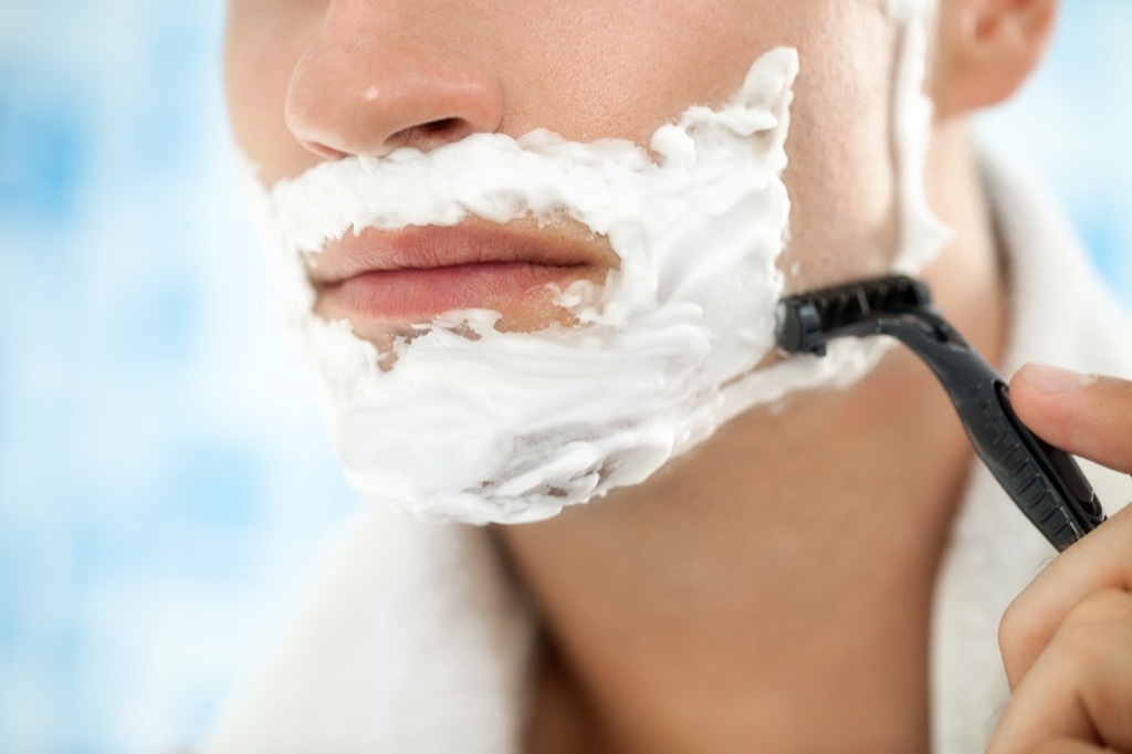 man shaving close up