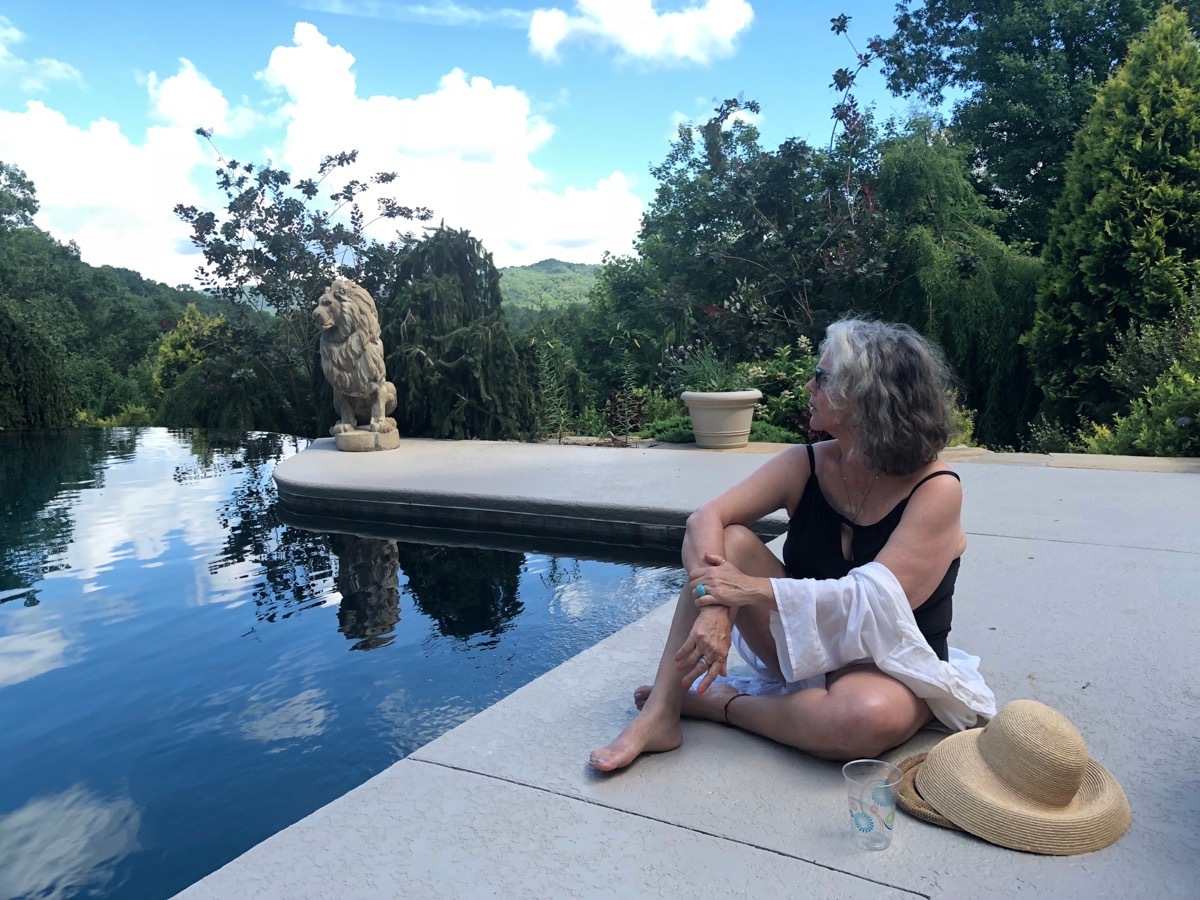 Older Woman Sitting by the Pool