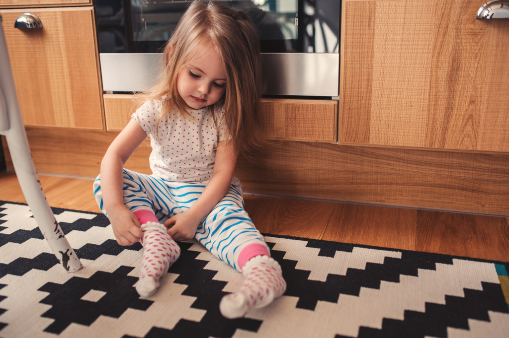 Toddler Daughter Dressing Herself