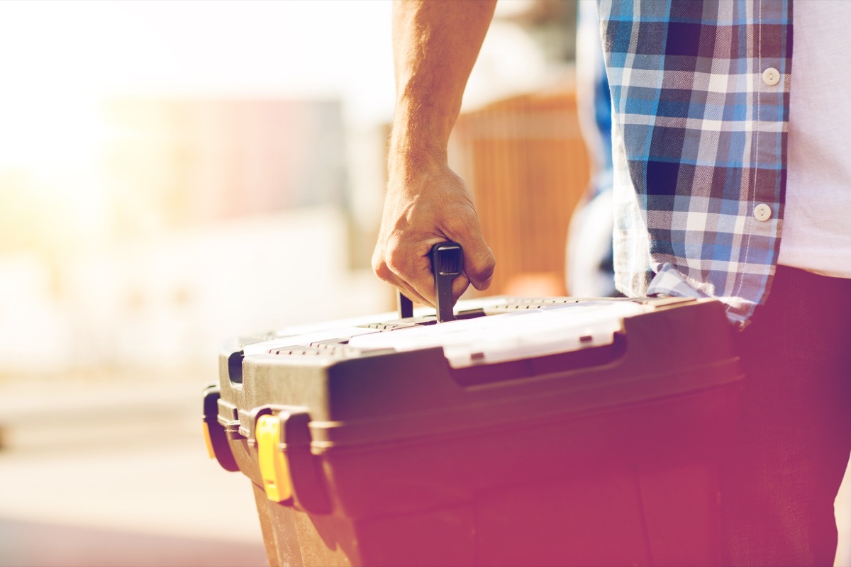 Man holding a tool box