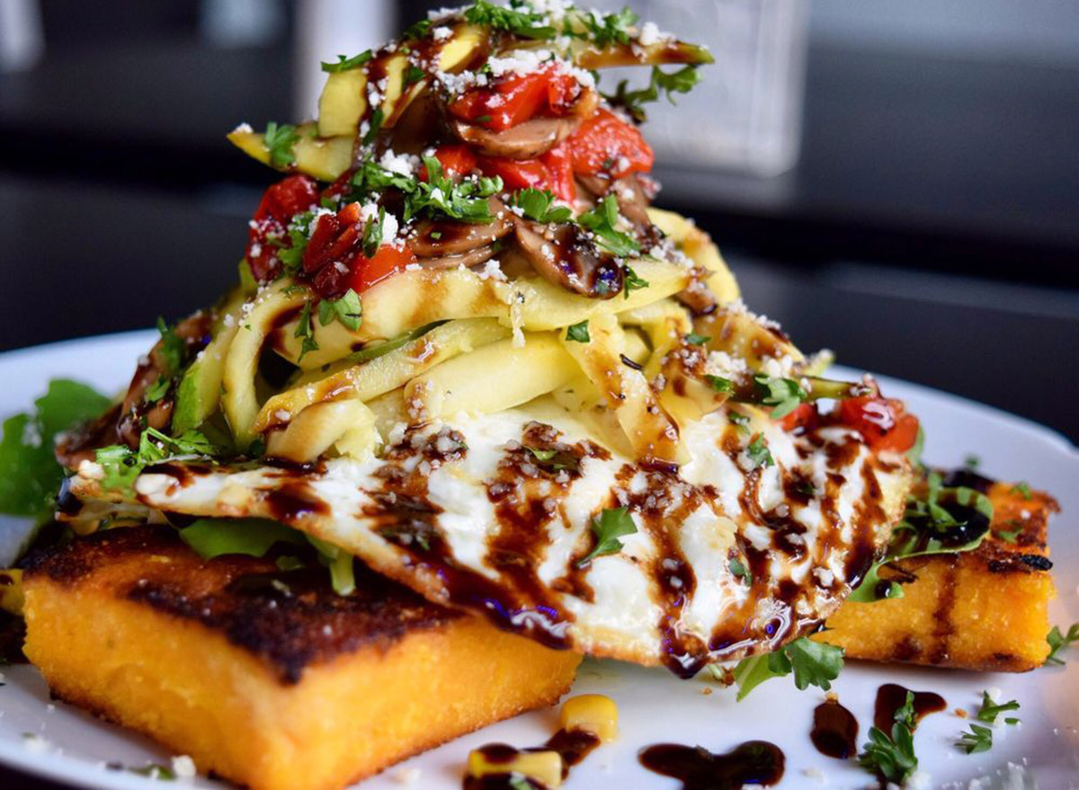 stacked salad with veggies and polenta