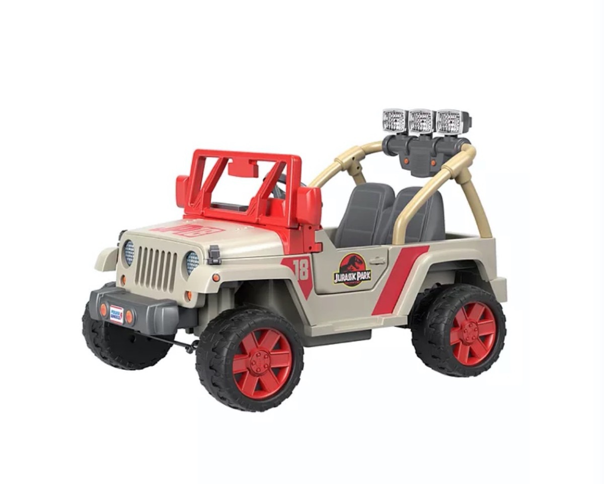 beige and red ride-on toy that looks like jeep