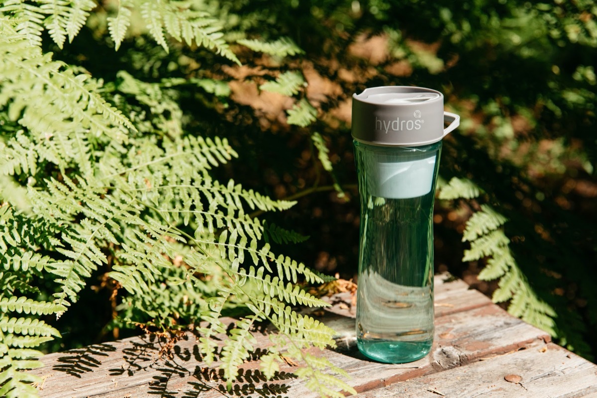 green hydros water bottle outdoors