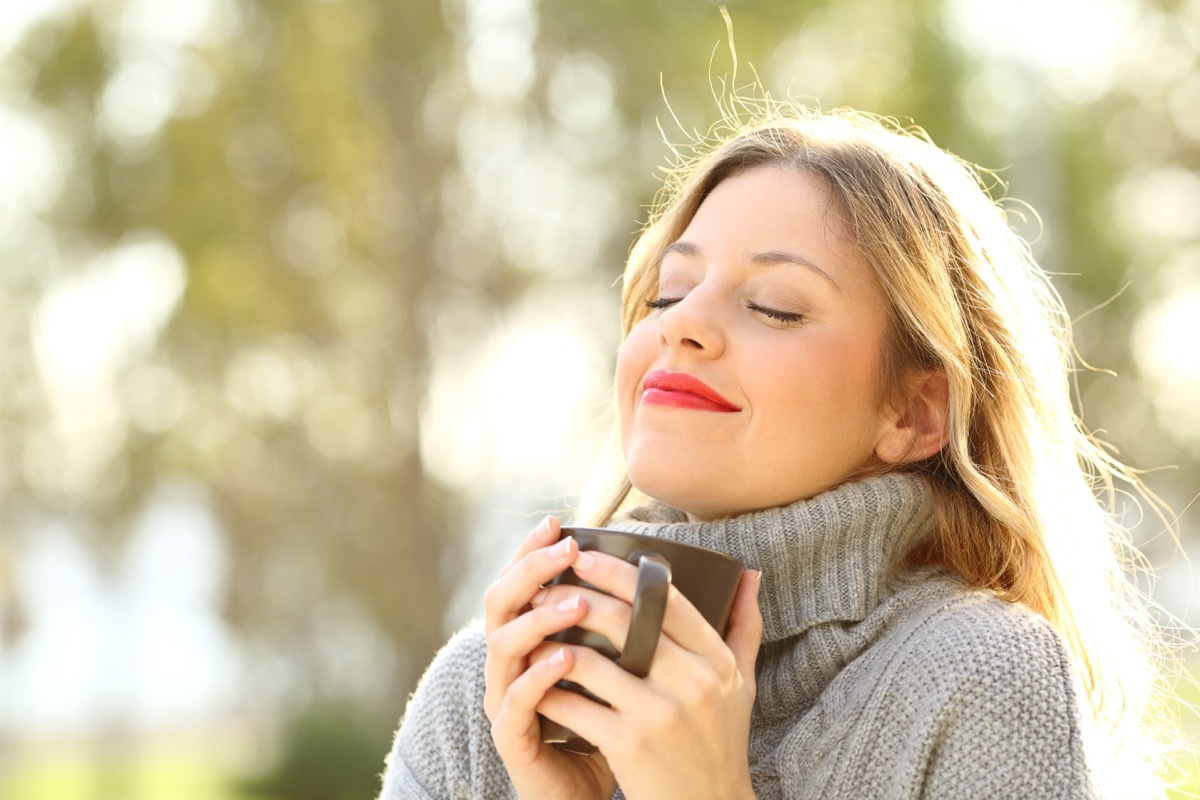 Mindful woman drinking tea