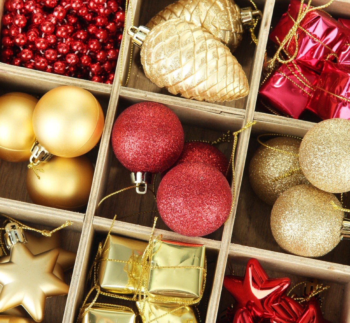 box of red and gold christmas ornaments