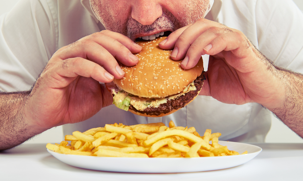 Man Eating Cheeseburger Bogus 20th Century Facts