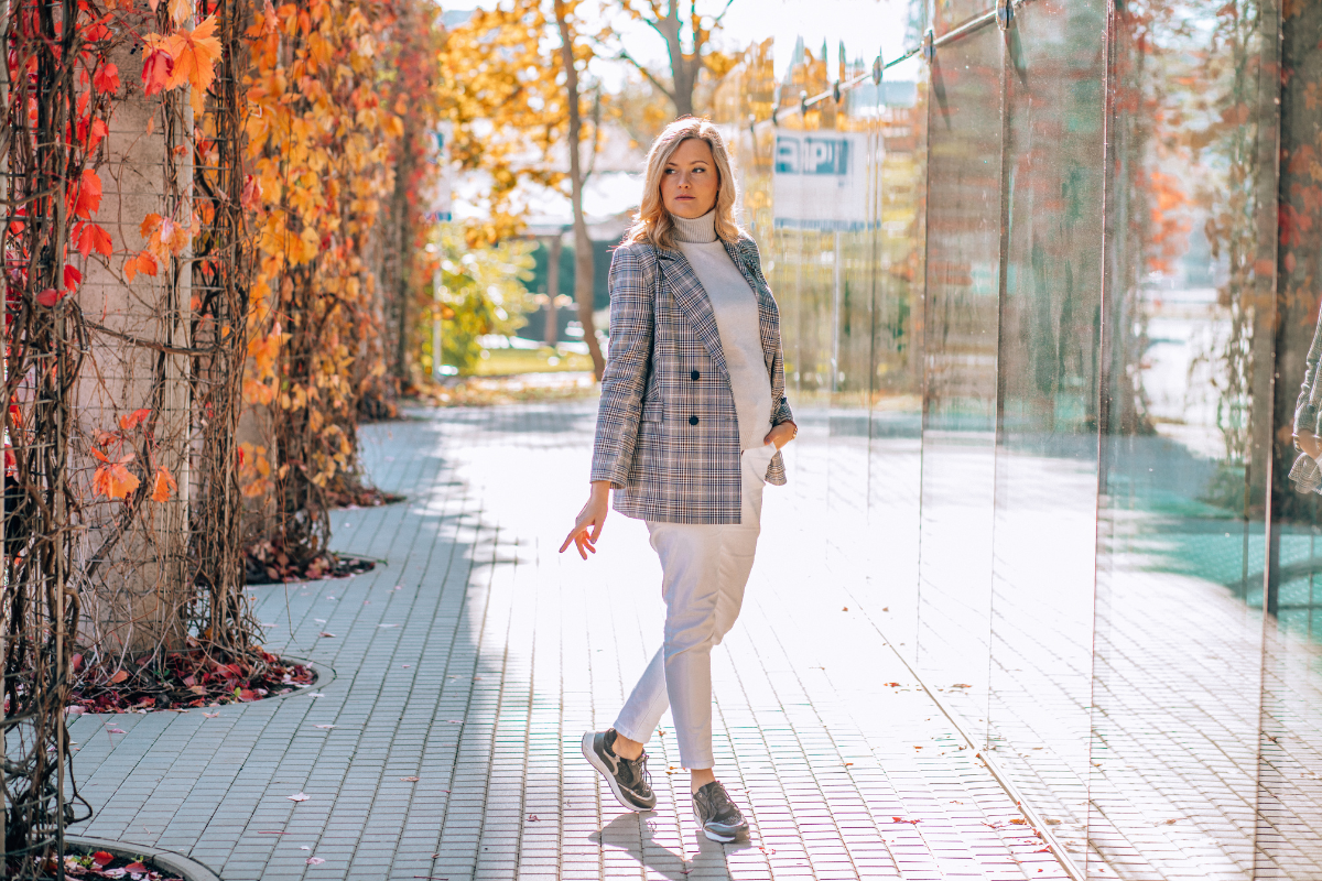 woman in blazer and jeans