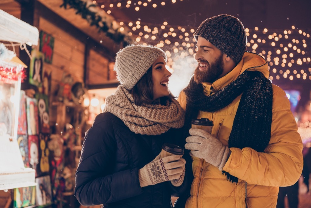 couple looking at christmas lights, date night ideas