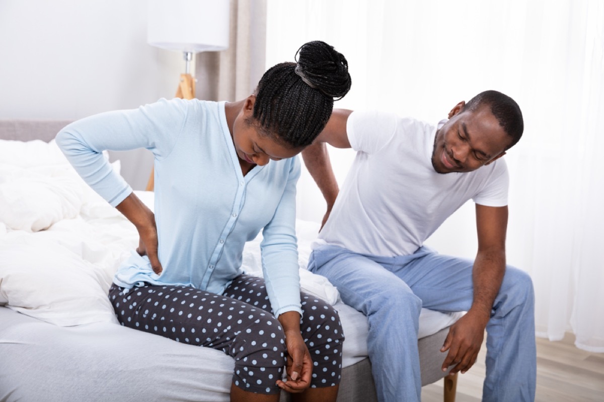 couple with back pain, signs you need a new mattress