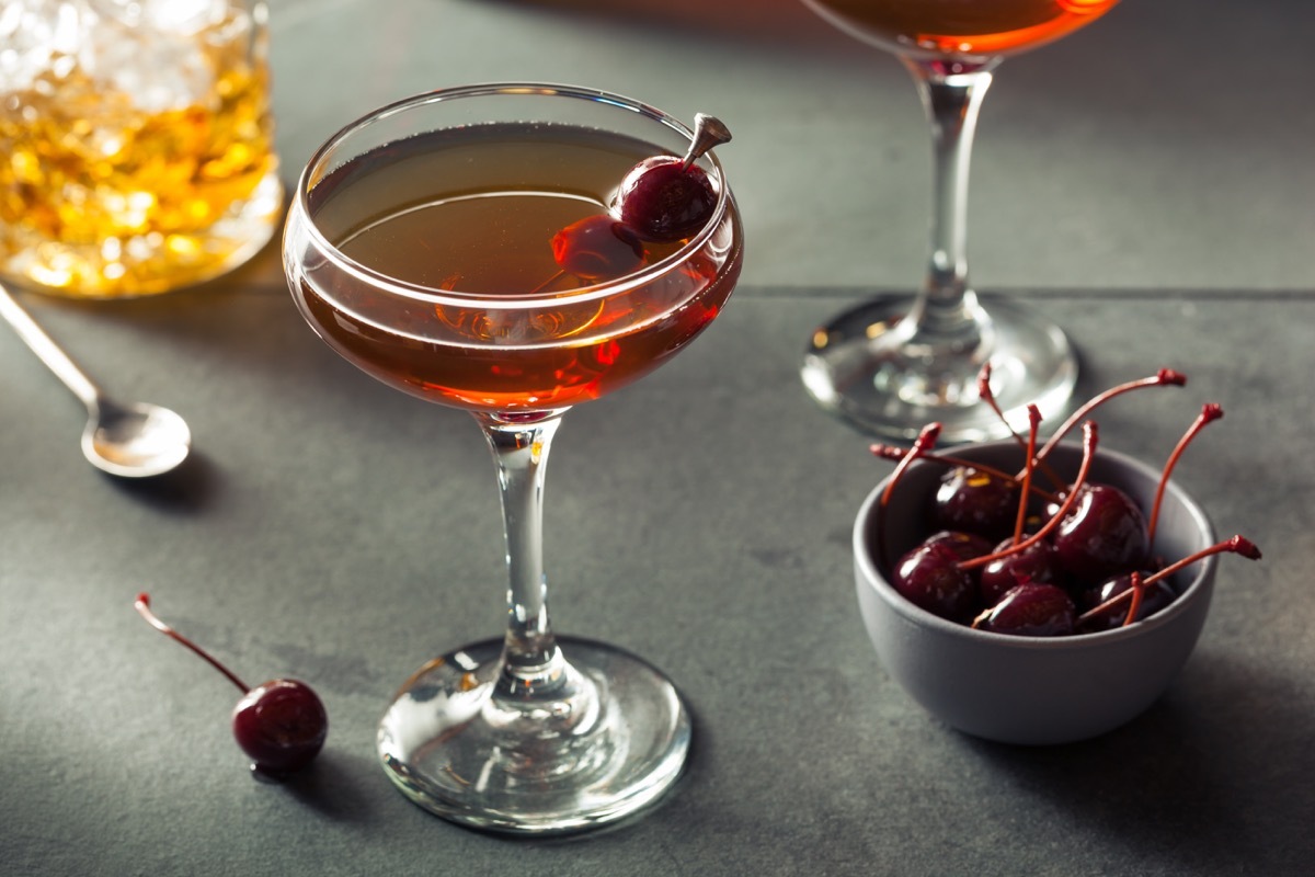 manhattan cocktail with cherries