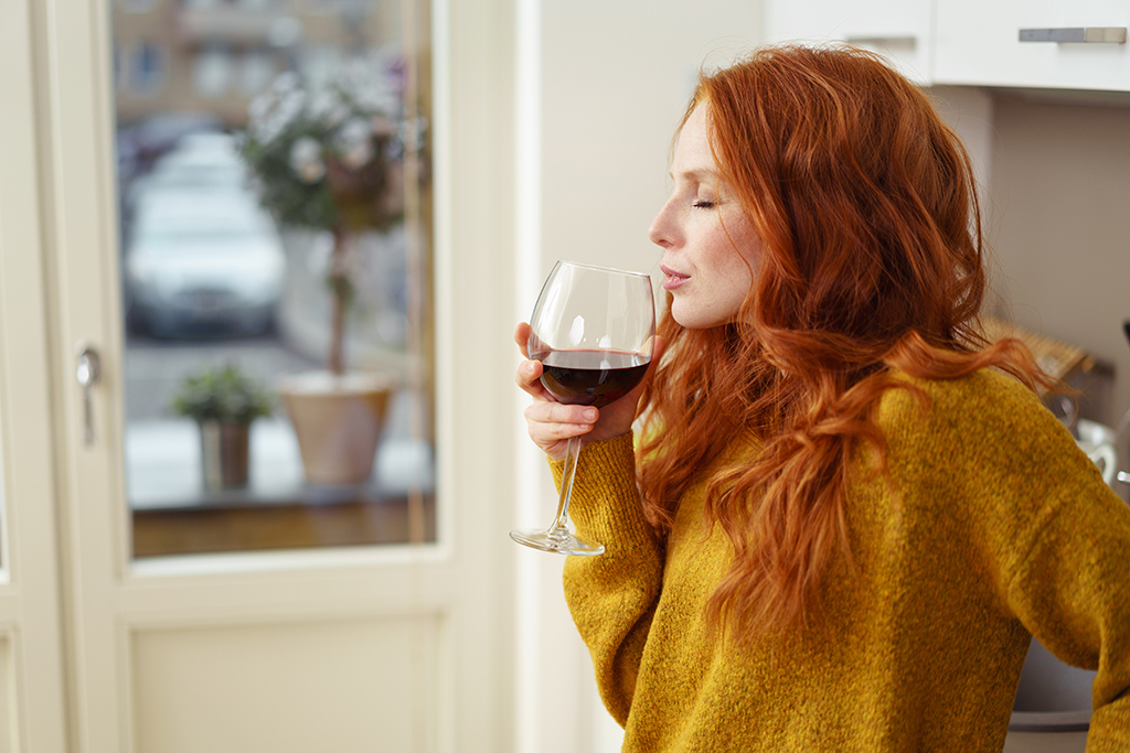 woman drinking red wine