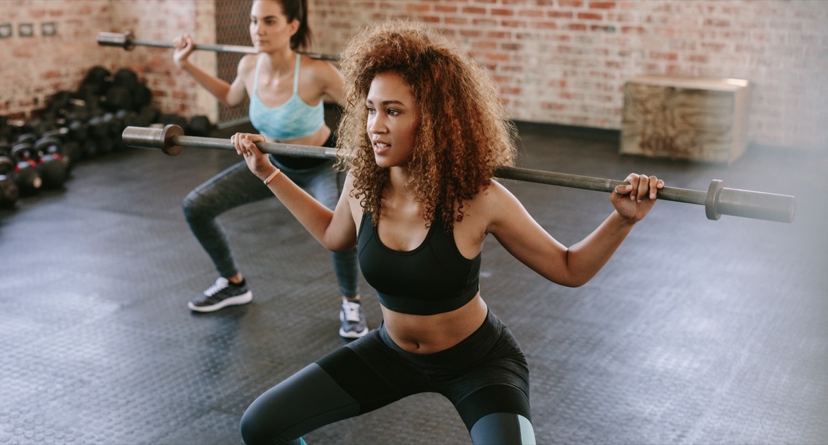 women exercising with dumbells