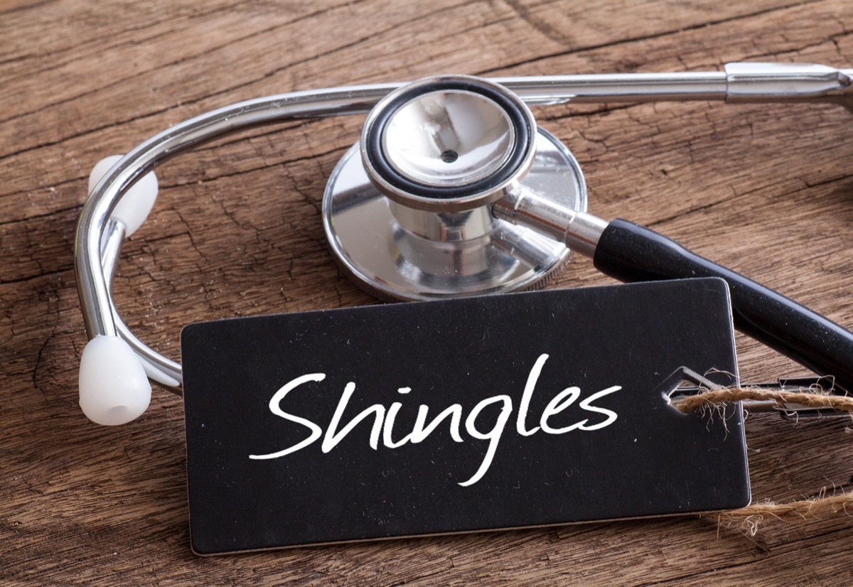 Stethoscope on wood with shingles.