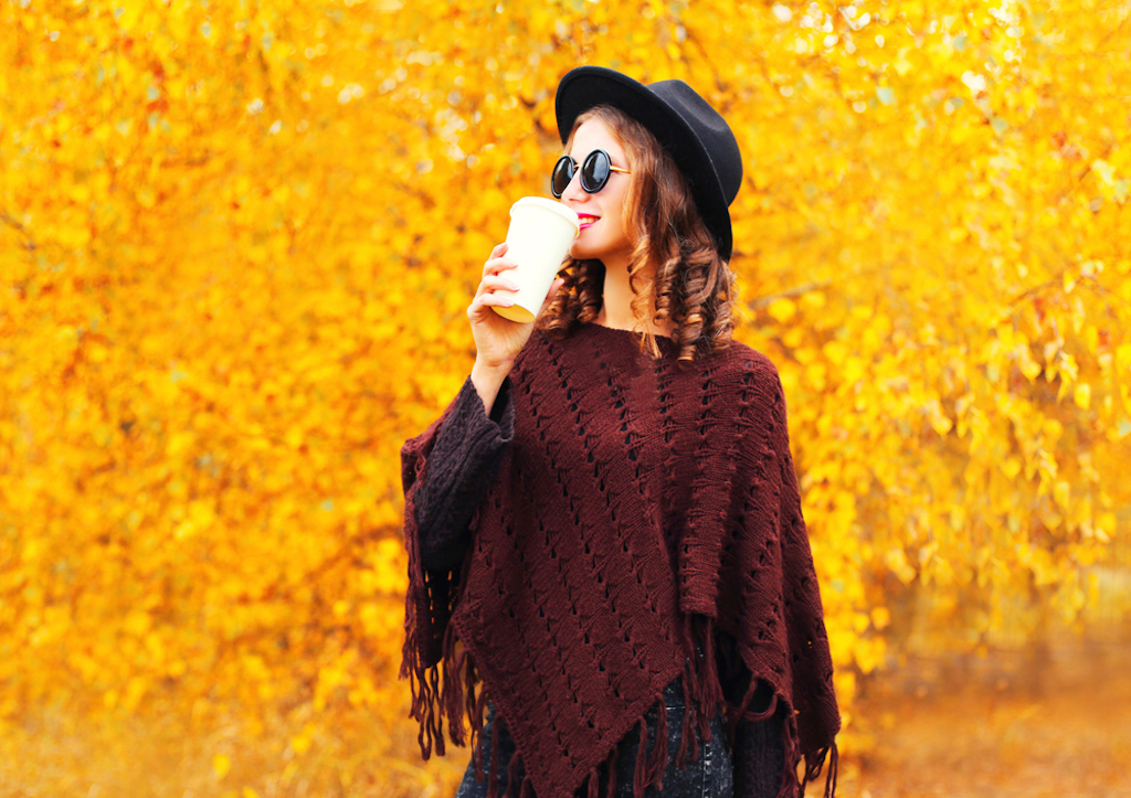 woman wearing poncho